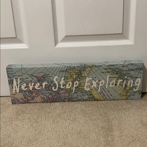 Home decor piece featuring world map
